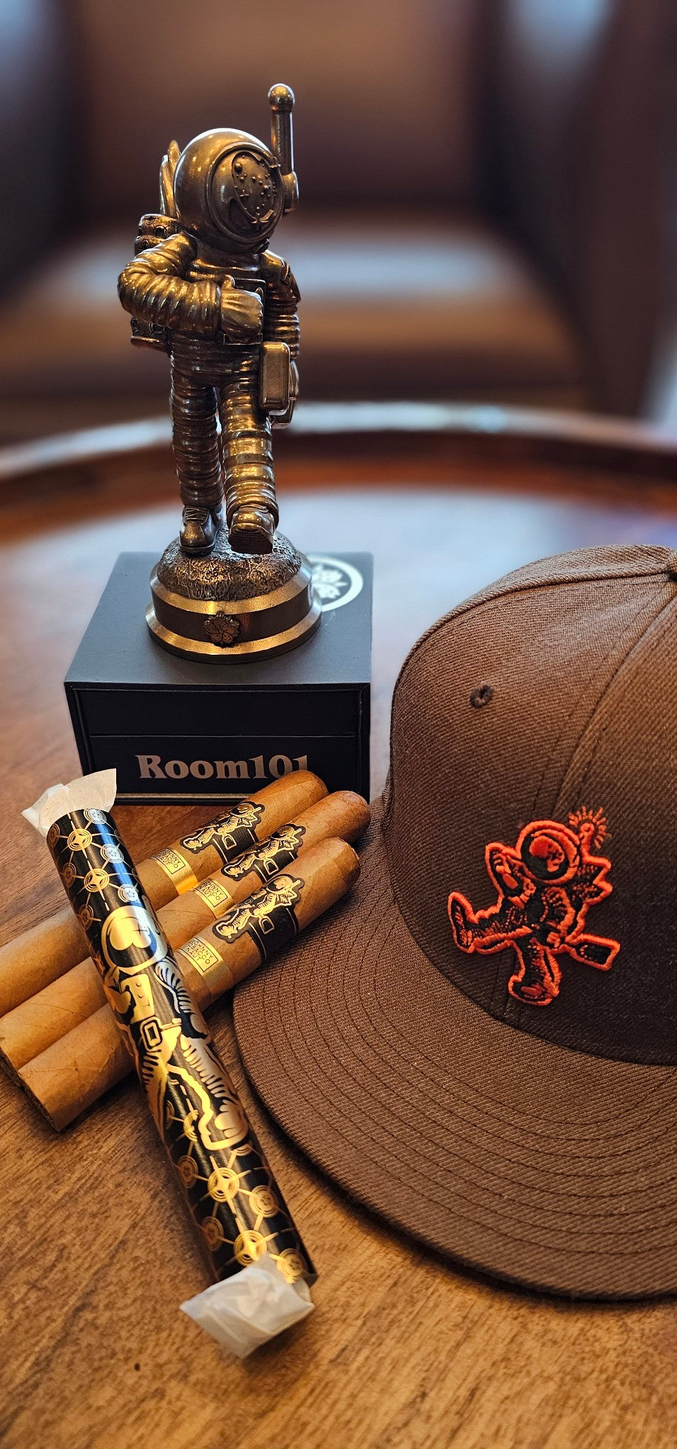 Room 101 - Johnny Tobacconaut Sampler w/ Brown/Orange Hat